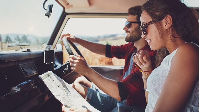 Couple driving responsibly on the open road